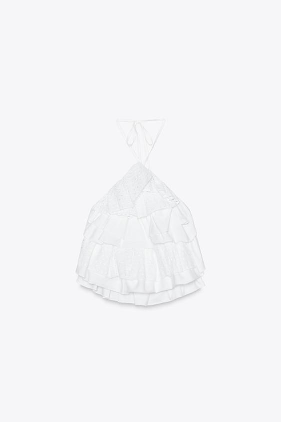Home 33 اپلیکیشن فارسی زارا، که توسط تیم تهران زارا طراحی و ساخته شده، راهی نوین برای خرید محصولات اورجینال زارا با بهترین قیمت است. این اپلیکیشن دسترسی به جدیدترین و محبوبترین محصولات زارا را با سهولت و اطمینان فراهم میکند. تمامی محصولات به طور مستقیم از برند اصلی تهیه شده و با تضمین اصالت به کاربران عرضه میشود. با اپلیکیشن فارسی زارا، تجربهای سریع، مطمئن و مقرونبهصرفه از خرید آنلاین را تجربه کنید.. تاپ مجلسی زنانه زارا halter top with ruffles